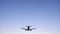 Aeroplane Flying Overhead against Blue Sky