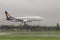 Aeroplane landing in cloudy weather