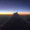 Aeroplane window view at sunset