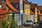 Aeroskobing, Denmark - July 4th, 2012 - Narrow cobblestone street on the island of Aero with colorful historic residential buildin