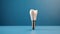 Aesthetic Dentistry of denture. Concept for dental prosthesis. demonstrating the placement of a dental implant isolate on a blue