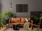 Aesthetic interior of living room with mock up poster frame, brown sofa, plants, black coffee table, bowl with coconuts, green