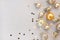 Aesthetic luxury festive Christmas, New Year banner. Gold pastel ornaments, decoration balls, star confetti, garland