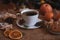 Aesthetics Christmas breakfast - cup of coffee, cookies, tangerines near Christmas tree.