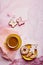 Aesthetics festive Easter holiday flat lay. Homemade pastel cookies and coffee cup. Springtime background