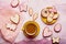 Aesthetics pastel Easter holiday flat lay. Homemade cookies and yellow coffee cup. happy Easter background