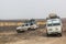 AFAR, ETHIOPIA - MARCH 26, 2019: Vehicles crossing lava fields on their way from Erta Ale volcano in Afar depression