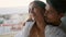 Affectionate people embracing terrace closeup. Latina lovers enjoying marriage