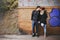 Affectionate teenage couple kissing on street