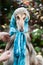 Afghan grey hound in a scarf.