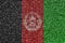 Afghanistan flag depicted on many small shiny sequins. Colorful festival background for party