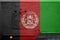 Afghanistan flag depicted on side part of military armored truck closeup. Army forces conceptual background