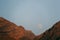 Afghanistan landscape, a mountain with a full moon in the background