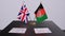 Afghanistan and UK flag. Politics concept, partner deal beetween countries. Partnership agreement of governments 3D