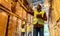 Afican Black warehouse worker with tablet portrait