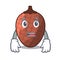 Afraid mascot cartoon of moriche palm fruits