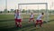 Afraid young players arrange wall goalkeeper misses ball