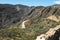 Africa- Panorama of a Narrow Dirt Road Curving Through the Swartberg Pass