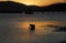 Africa- Sunset With Ancient Boat Over the Knysna Inlet