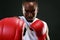 African American boxer punching in camera