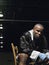 African American Boxer Sitting On Chair