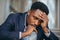 African american businessman in business suit frustrated got bad news from work, fired depressed sitting on stairs, close-up