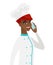 African-american chef talking on a mobile phone.