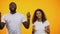 African-American couple dancing together feeling rhythm of music, background