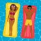African american couple floating on inflatable mattresses in swimming pool