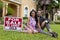 African American Couple & House For Sale Sold Sign