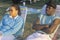 An African-American couple on lawn chairs, Los Angeles, CA