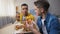 African-American and European teenage friends enjoying pizza, unhealthy food