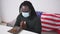 African American With Face Mask Kneeling, Bowing and Praying In Silence At The Living Room - Praying Covid-19 Pandemic