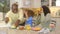 African American family  being silly with food in kitchen