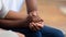 African american family couple holding hands, close up view