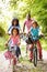 African American Family On Cycle Ride In Countryside