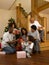 African American family exchanging Christmas gifts