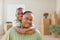 African American Father and Son In Room with Packed Moving Boxes