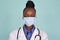 African american female doctor wear face mask look at camera, headshot portrait.