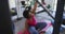 African american female plus size sitting on exercise mat working out