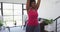 African american female plus size standing on exercise mat working out