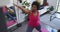 African american female plus size standing on exercise mat working out