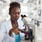 African-american female scientist, student or tech works with a