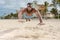 African American Fitness Model pushup on the Beach