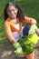 African American Girl Child Gardening with Flowers