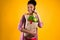 African American girl with groceries bags isolated