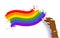 African american hand drawing rainbow LGBT flag