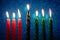 African American Kwanzaa holiday. Seven burning candles in traditional kinara candlestick