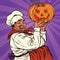 African American or Latino cook with a Halloween pumpkin