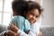 African American little girl embrace adorable brother